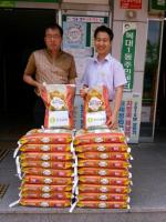 강서교회, 흥부네 곳간 쌀 기부